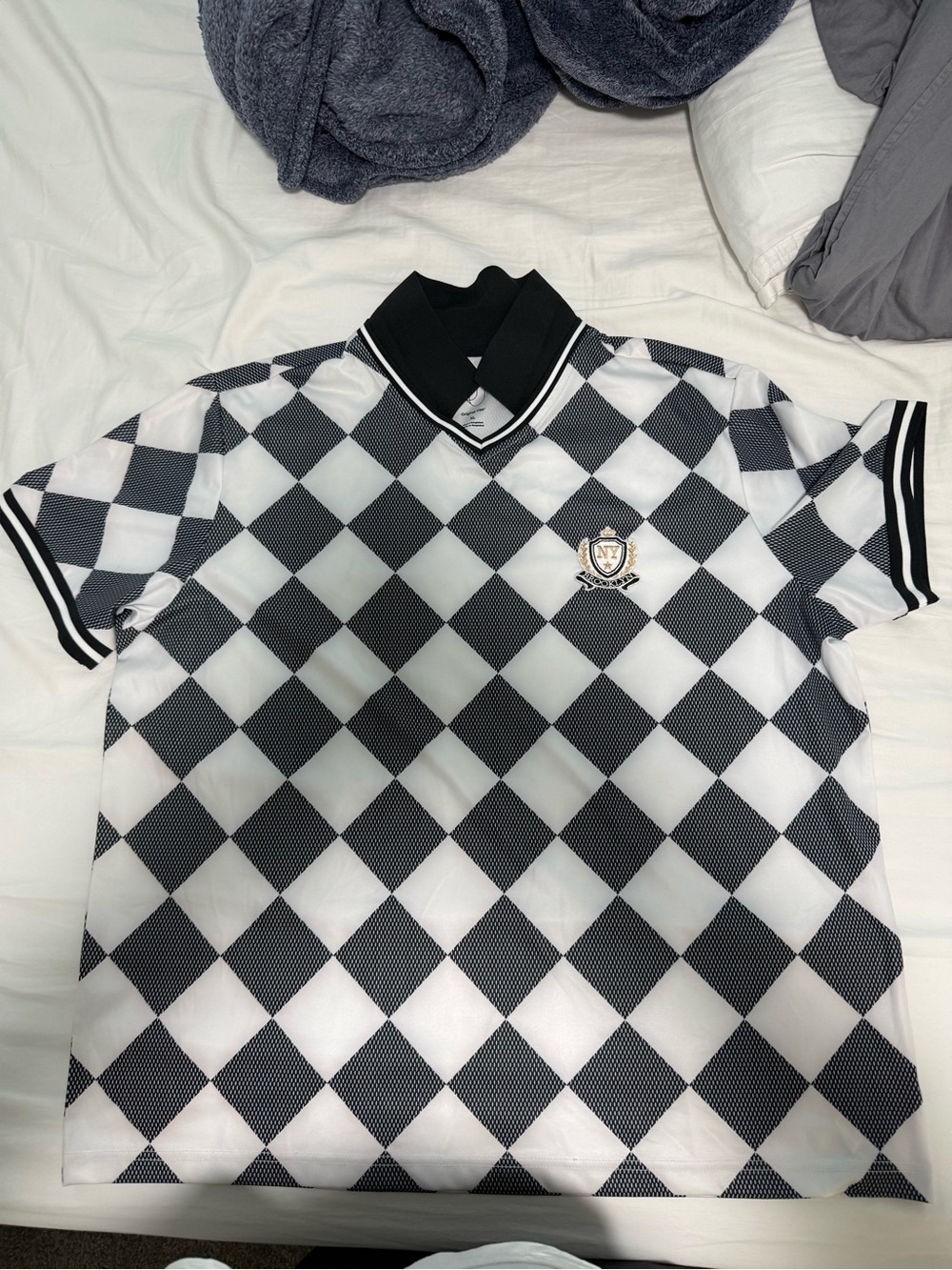 Original Use Black and White V-Neck Argyle Polo